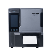 A SATO CL4.SXR industrial label printer with a dark gray and black chassis, featuring a front-facing touchscreen display and a paper output tray with a white sheet of paper, shown against a plain white background.