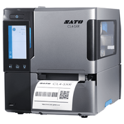 A silver and black SATO CL4-SXR industrial label printer with a front display screen and a white label being printed, shown on a plain white background.