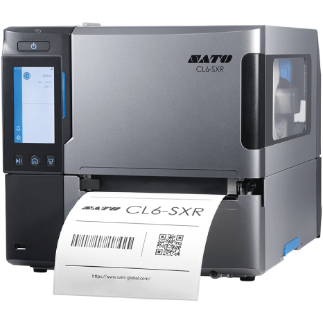A silver and black SATO CL4-SXR industrial label printer with a front display screen and a white label being printed, shown on a plain white background.