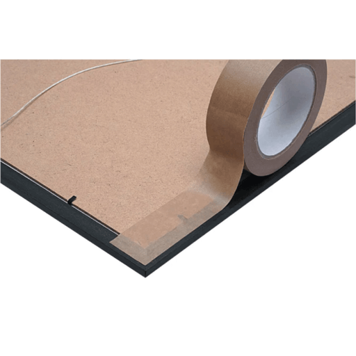 Roll of brown tape on a cardboard surface with a white background