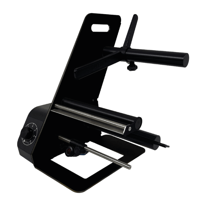 Black metal tool or device on a white background