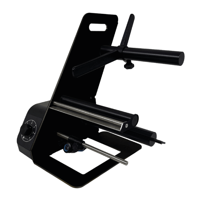 Black metal tool or device on a white background