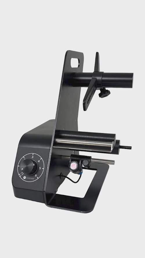 Black present and peel label dispenser