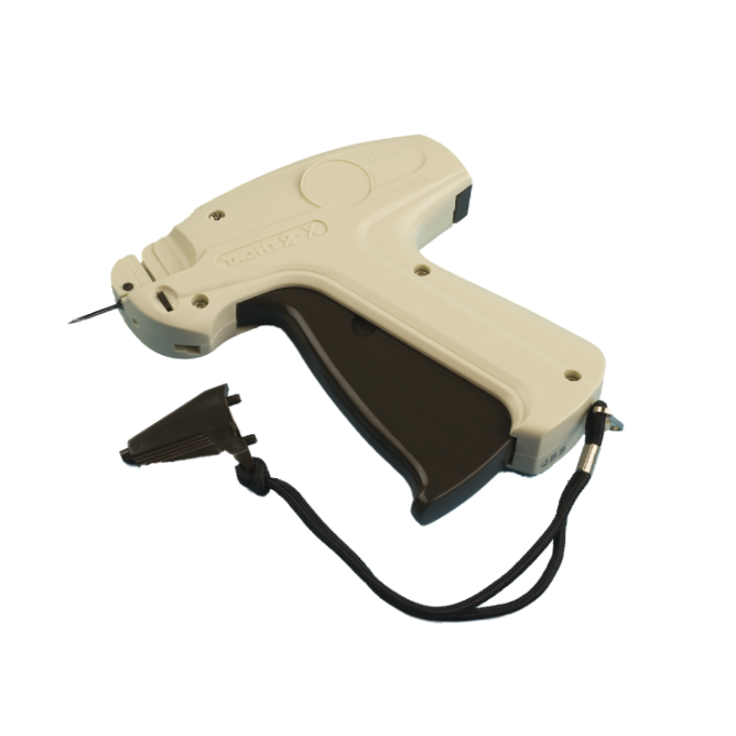 A Tach-It Fine Mk I Tagging Gun, primarily in a beige colour, with a brown handle and tagging needle.