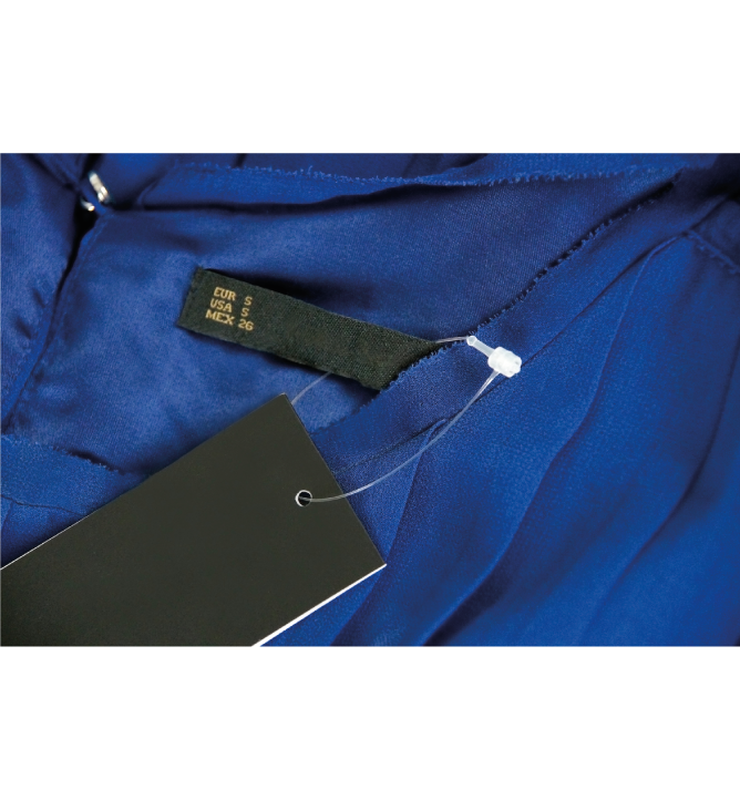 A white nylon security loop with a beaded tie, against a blue background.